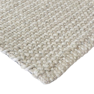 Close-up of a textured beige carpet