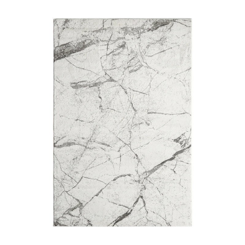 Marble-patterned surface with gray and white colors on a white background