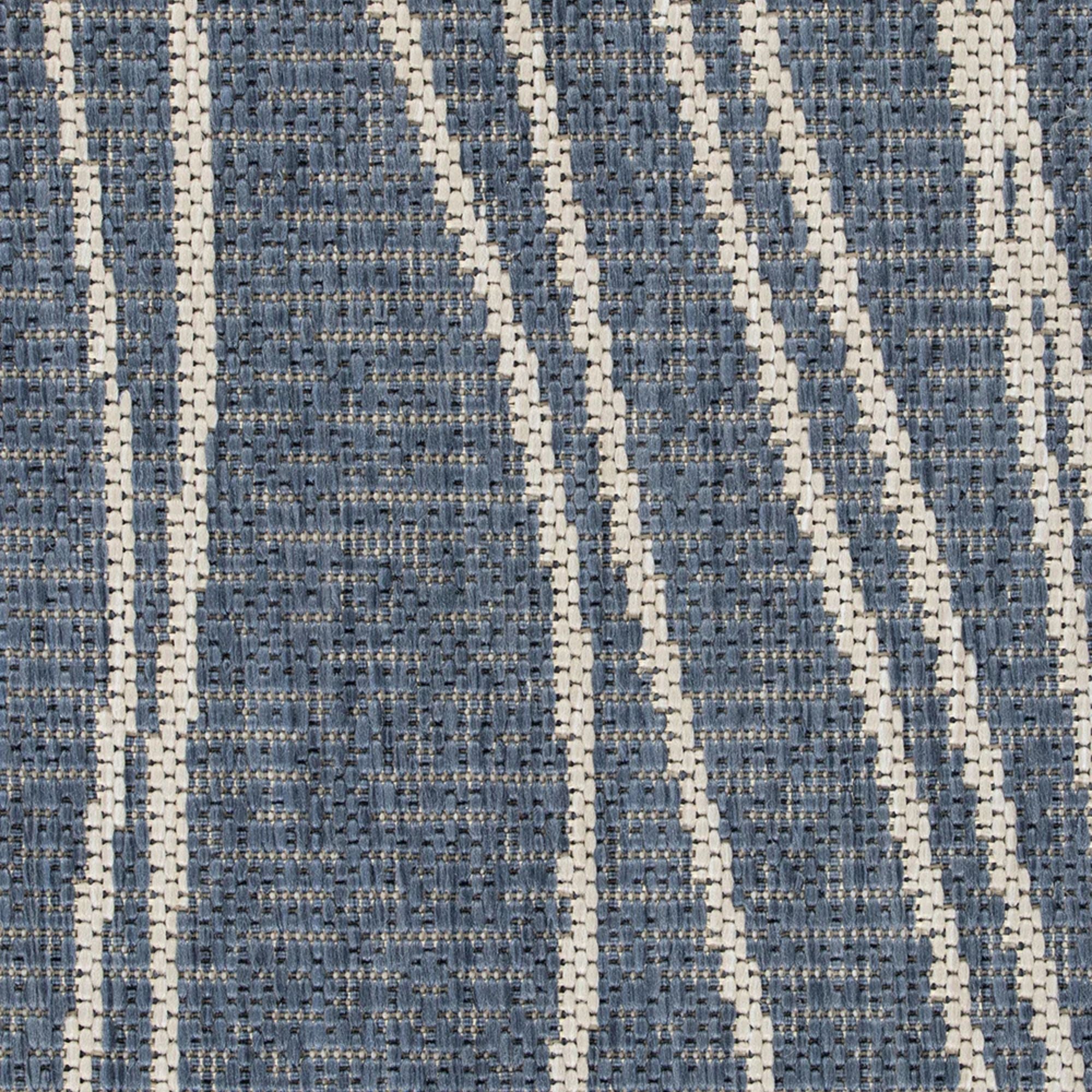 Textured blue and white patterned fabric swatch