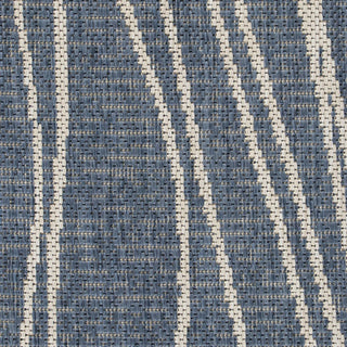 Textured blue and white patterned fabric swatch