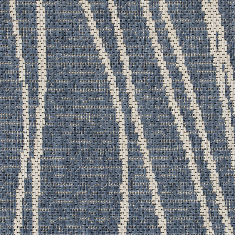 Textured blue and white patterned fabric swatch