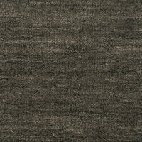 Close-up of a textured brown fabric surface