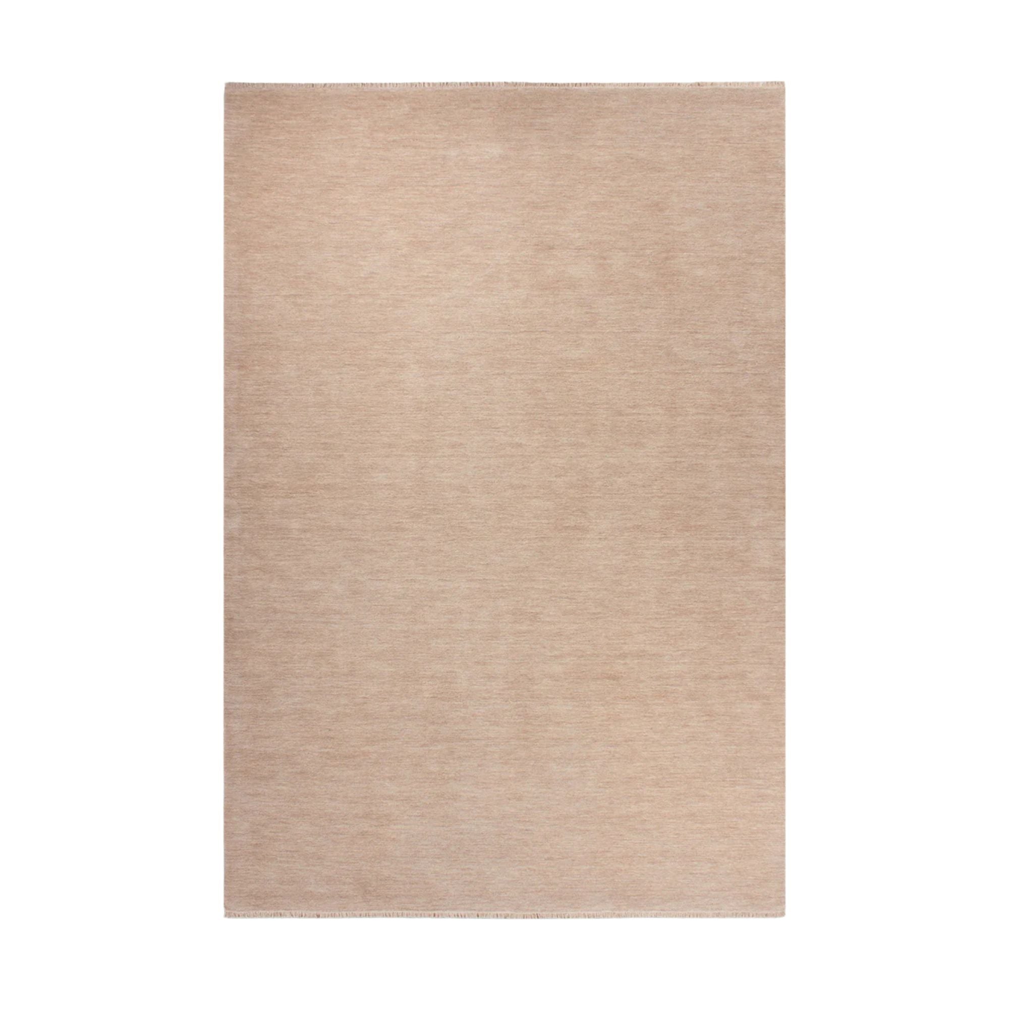 Beige rug on a white background