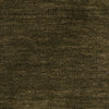 Close-up of a textured moss fabric surface