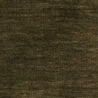 Close-up of a textured moss fabric surface