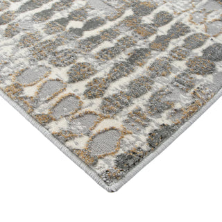 Patterned rug with geometric design on a white background