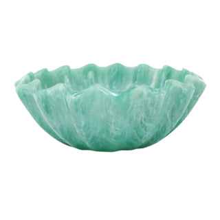 Green resin bowl with wavy edge on a white background