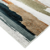 Close-up of a multicolored striped rug with shades of brown, beige, and gray.