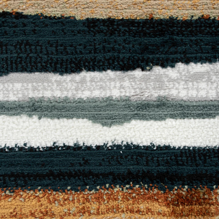 Close-up of a striped rug with various colors including black, white, gray, and brown.