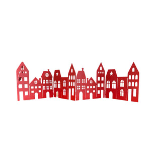 Red metal Christmas village cut-out decoration with houses in a row