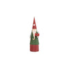Small metal Santa figurine with red hat and green coat holding a present
