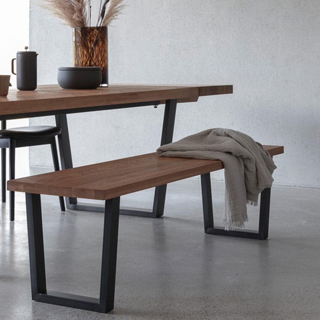 Industrial inspired dining setting with Calia table and oak bench seat