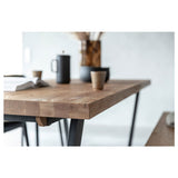Oak dining table with metal frame