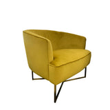 Chrighton Gold velvet occasional chair with gold metal legs.
