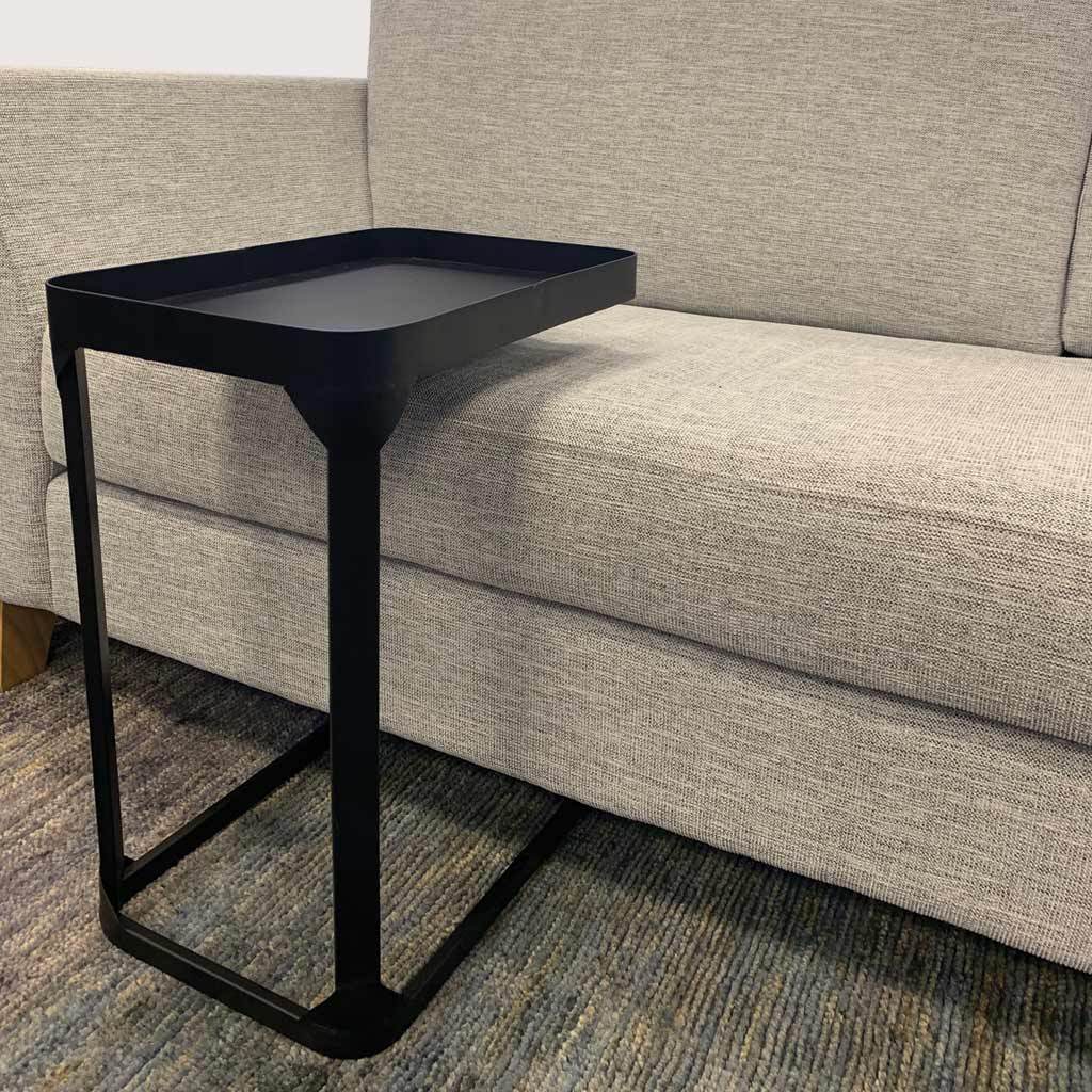 Metal side table used with sofa