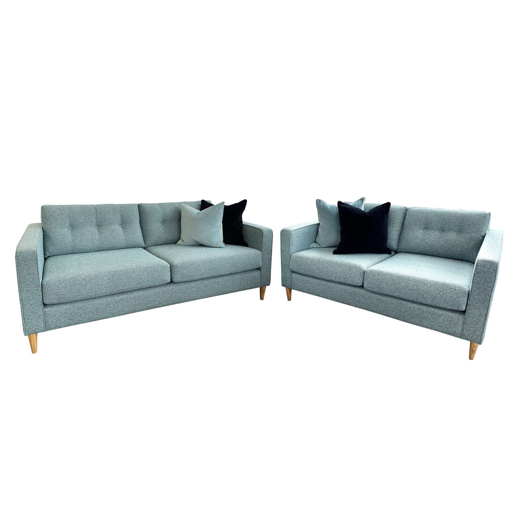 Prague 3 seater sofa and 2.5 seater sofa in duck egg blue with square arms, buttoned backs and piping.