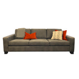 Stevo 3.5 seater sofa styled with red cushions